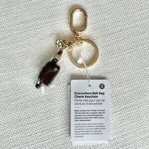 Lululemon Everywhere Belt Bag Charm Keychain Plum Gold NWT Accessory